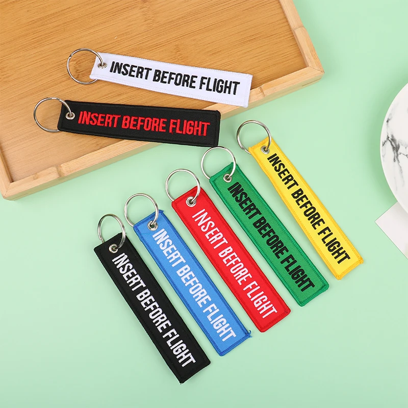 1PCS Car Key Ring Key Fobs Chaveiro INSERT BEFORE FLIGHT Keychain Jewelry Popular llaver Car Motorcycle Key Tag OEM Embroidery