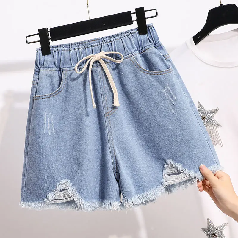 Fashion Elastic Lace Up Spliced Tassel Denim Shorts Women's Clothing 2024 Summer New Loose Solid Color High Waist Casual Shorts