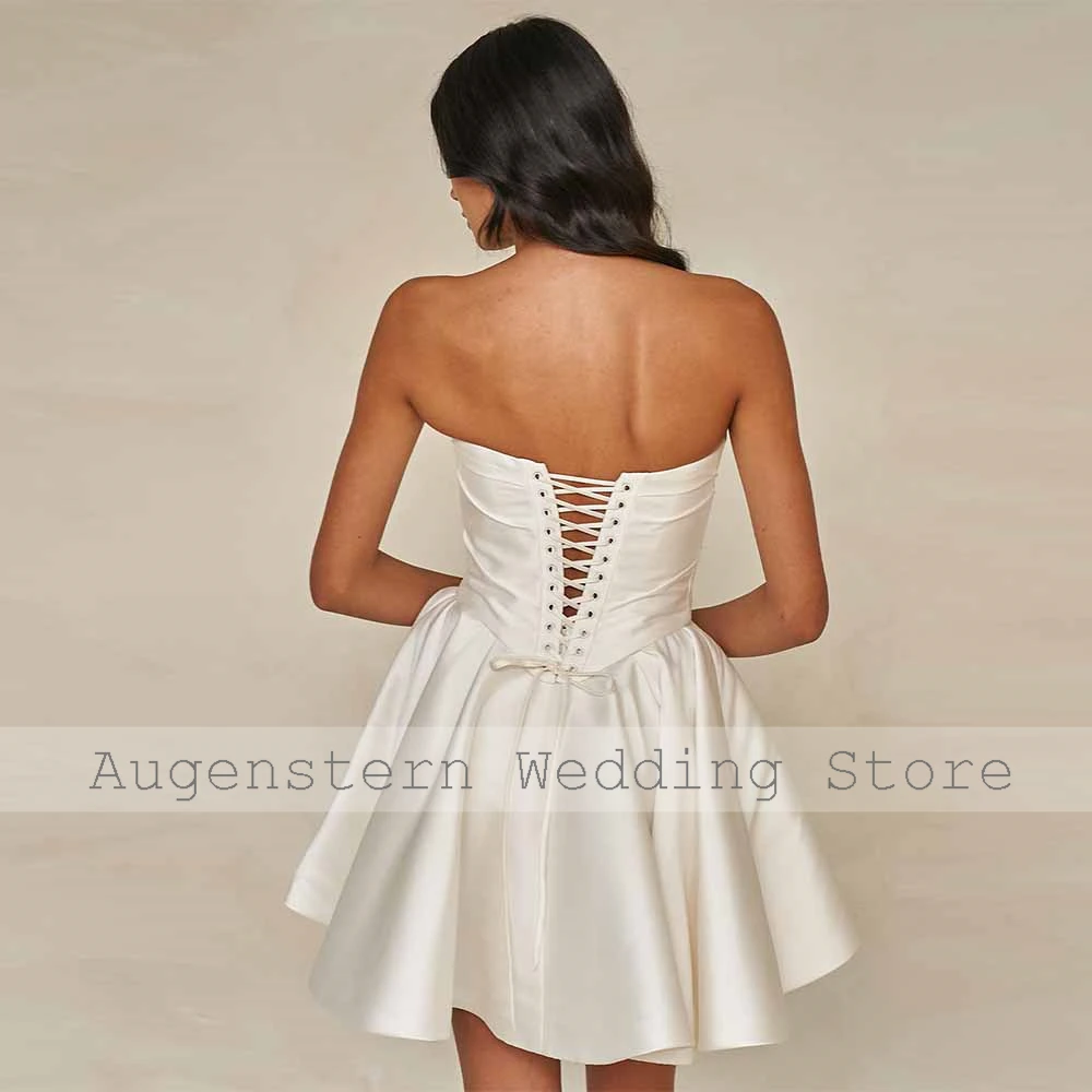 Charmante korte bruidsjurken satijn a-lijn bruiloft jurken ivoor strapless ruches plooi kant-up trouwjurken dames
