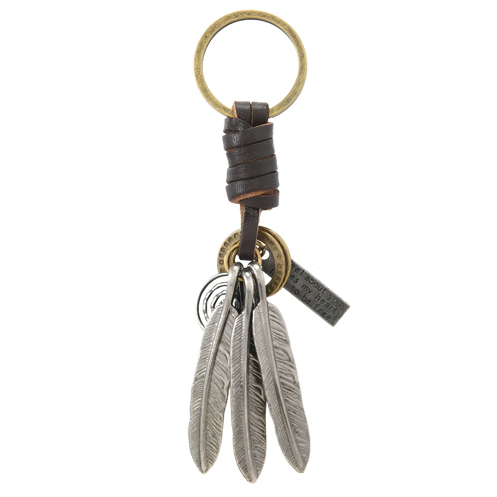 European and American new popular creative keychains men's and women's gifts alloy bronze horns retro woven cowhide pendant
