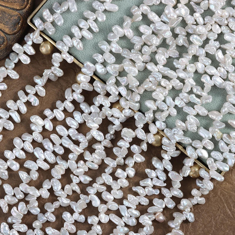 4mm cold-light feather petal Baroque natural freshwater irregular Sanqi-hole coreless regenerated beads DIY beads.