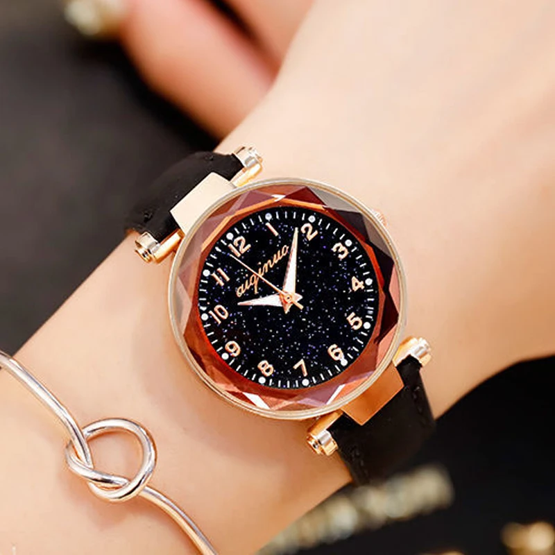 Un regalo lujoso de un reloj de mujer sencillo, estrellado, moderno, moderno y elegante.