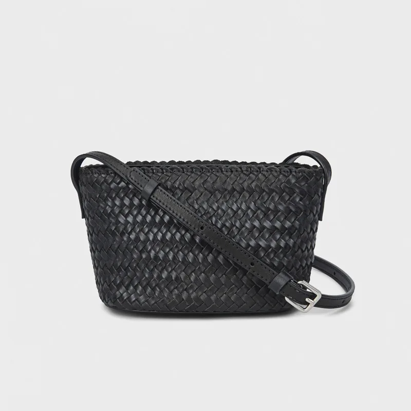 

Genuine leather hand-woven bag 2025 new niche design top layer cowhide black French ins fashion women one-shoulder crossbody bag