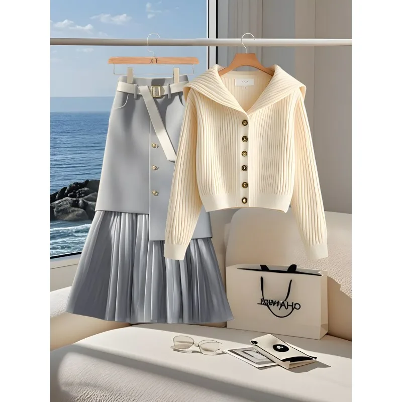 ชุดเสื้อคาร์ดิแกนถักนิตติ้งอเนกประสงค์สไตล์ต่างประเทศสุดชิคสำหรับฤดูใบไม้ผลิและฤดูใบไม้ร่วง พร้อมกระโปรงเข้าชุด ไม่ซ้ำใคร