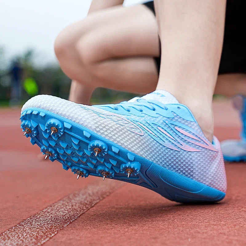 

Men Women Track and Field Shoes Non-slip Spikes Sneakers Unisex Sports Shoes Professional Nail Race Sneakers Youth Running Shoes