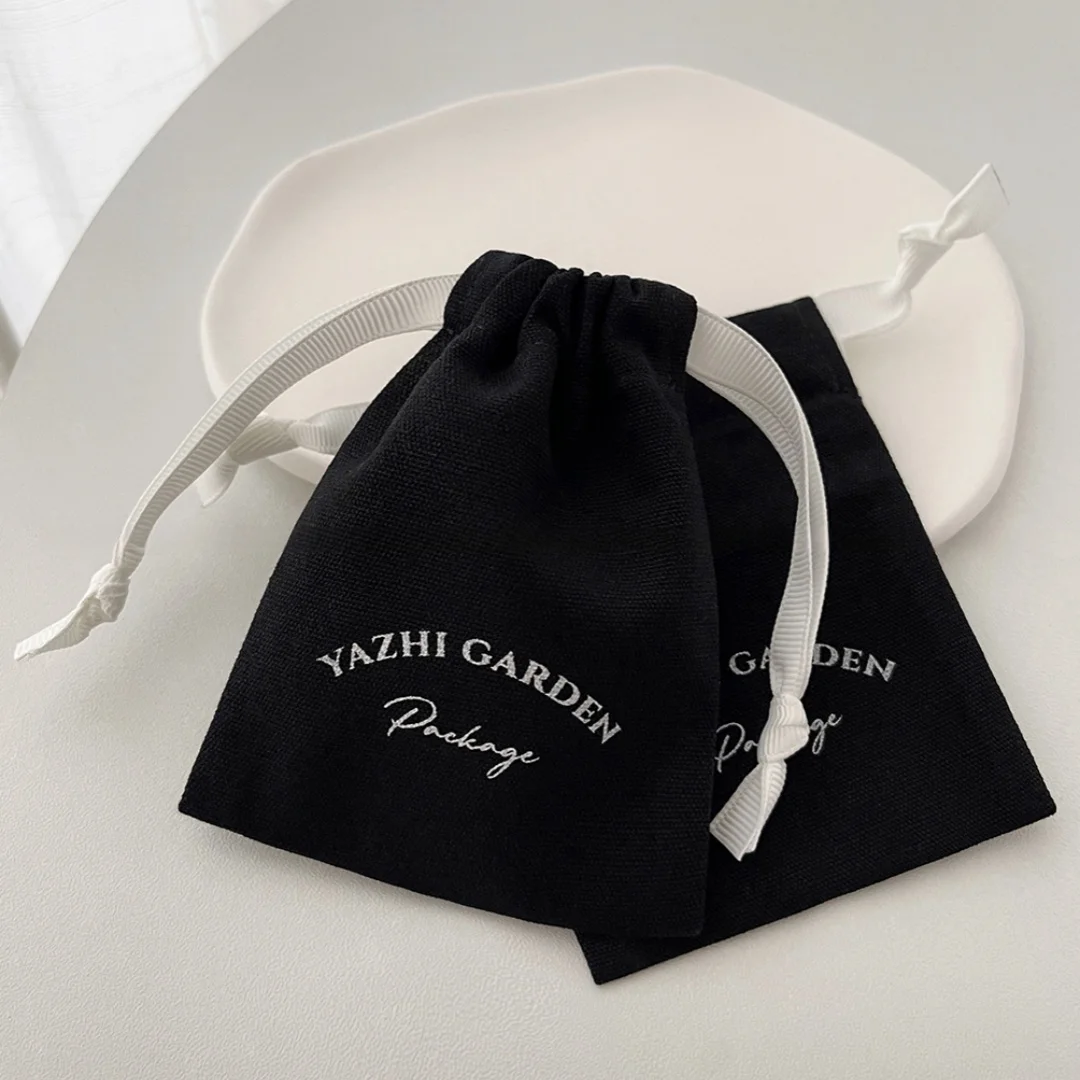 

Custom Logo Printed Cotton Canvas Drawstring Jewelry Pouch with Grosgrain Gift Dust Cotton Drawstring Pouch For jewelry