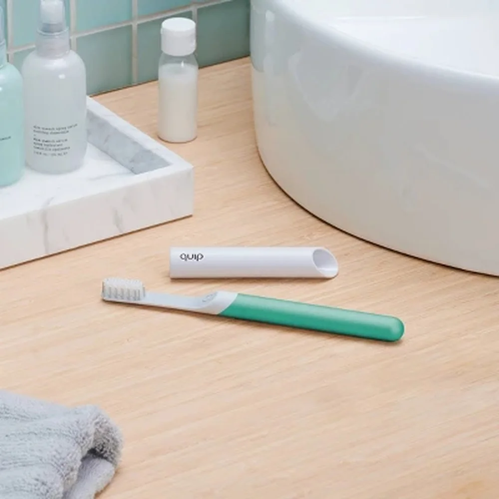 Electric Toothbrush with Sonic Vibrations 2-Minute Timer Replaceable Brush Head Travel Cap Water-Resistant Cordless Design Oral
