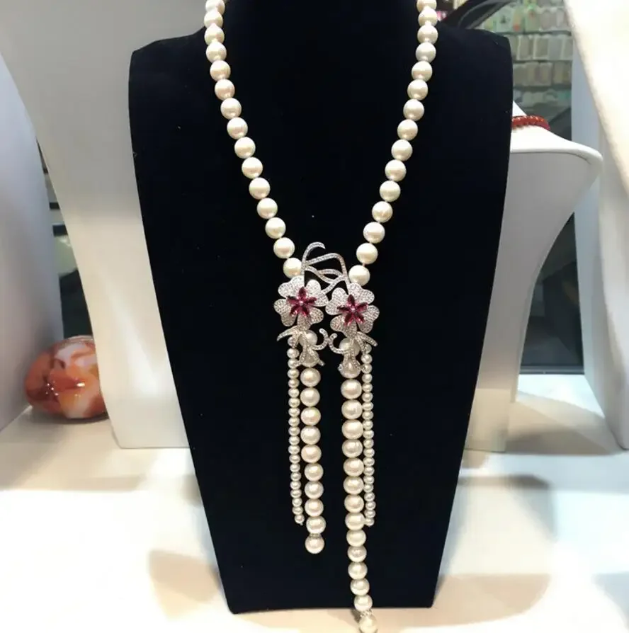 

Fashion jewelry Hand knotted natural white freshwater pearl micro inlay zircon accessories necklace tassel sweater