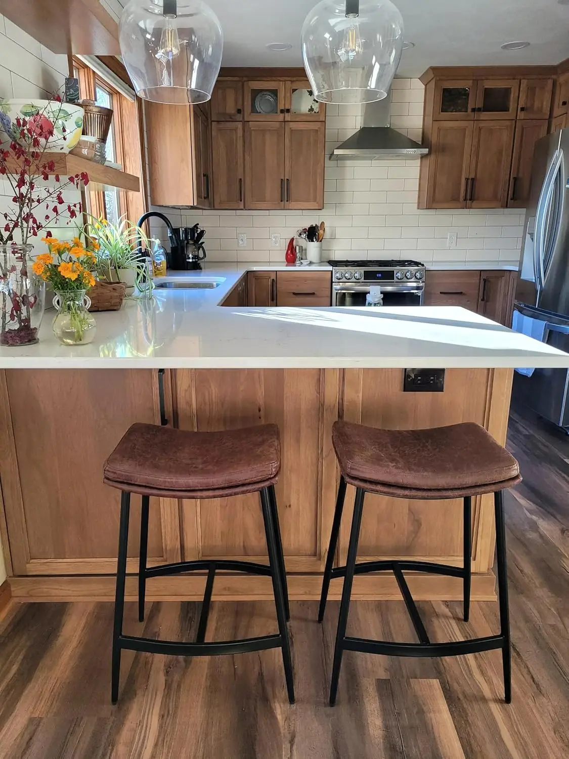 

Nathan James Arlo Modern Backless Upholstered Kitchen Counter Bar Stool with Double-Layered Saddle Seat and Black Metal Base