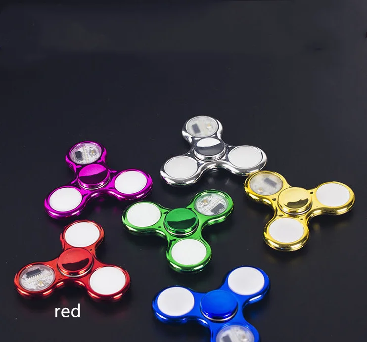 Leuchtende LED-Licht zappeln Spinner Hand Top Spinner leuchten in dunklem Licht