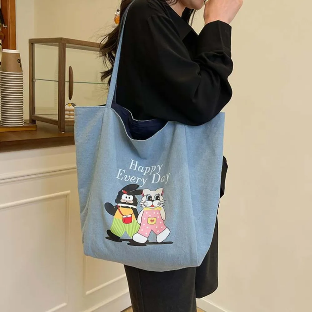 Borsa tote bifacciale con animali dei cartoni animati Borsa a tracolla leggera Borsa blu denim Borsa versatile in tela da donna in poliestere Primavera