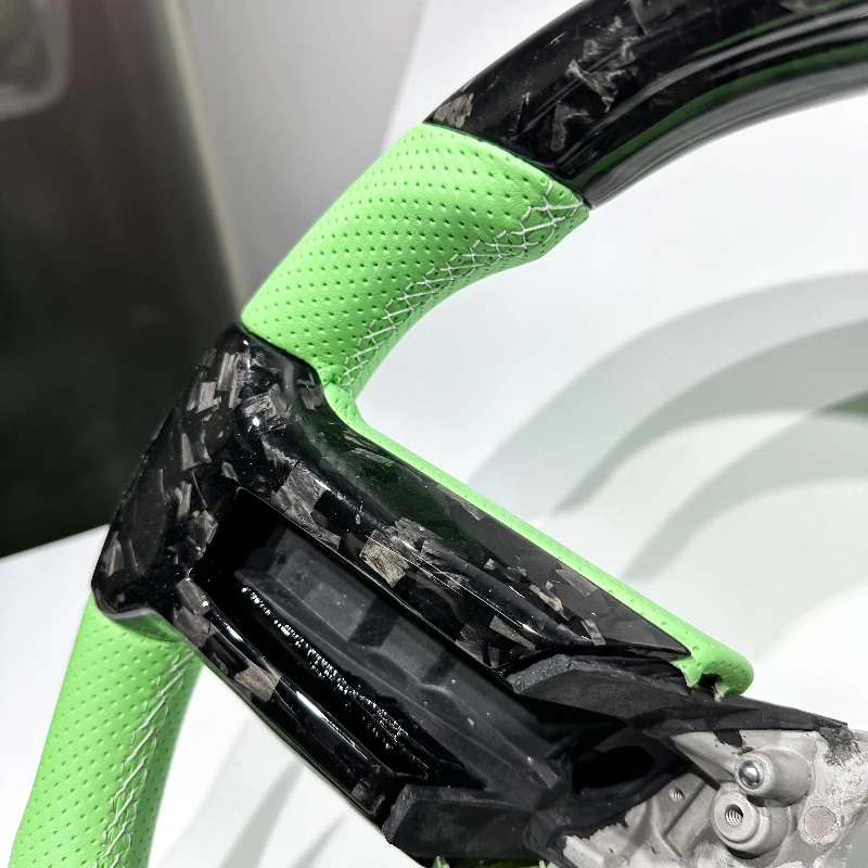Carbon fiber steering wheel for Ford Mustangs manufactured before 2014, customization available, direct from manufacturer. view 5
