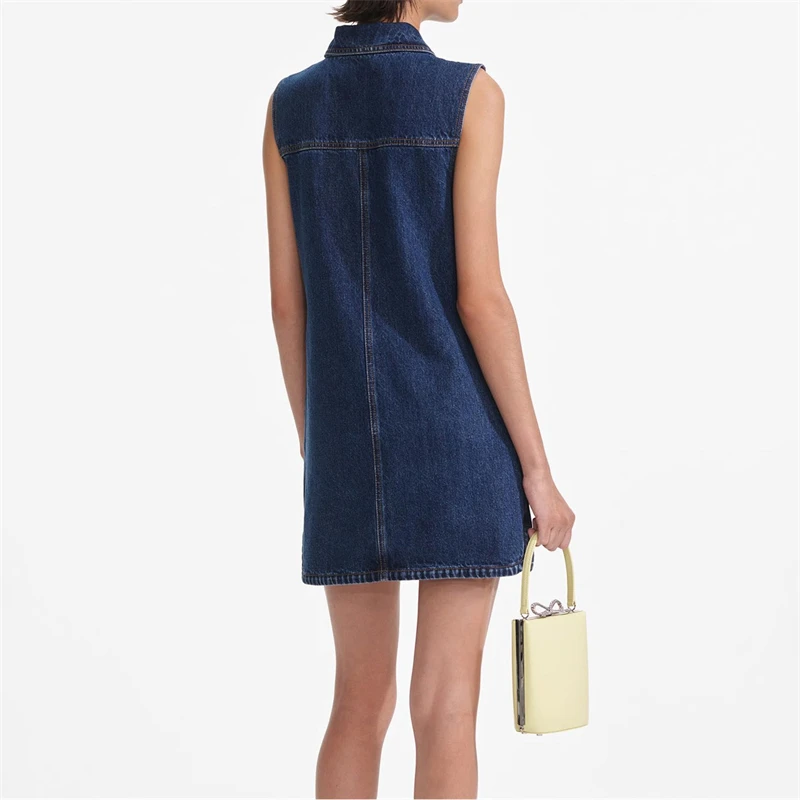 Un nuevo vestido vaquero sin mangas con múltiples bolsillos decorado con botones de diamantes lavados de algodón puro con solapa para mujer de verano y mini de moda