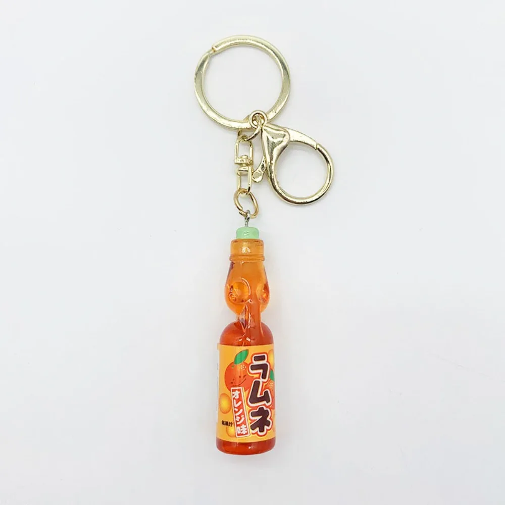 Nueva simulación de canicas Bobble Soda llavero japonés miniatura Ramune Soda llavero lindo Soda bebida encanto bolsa Accesorios