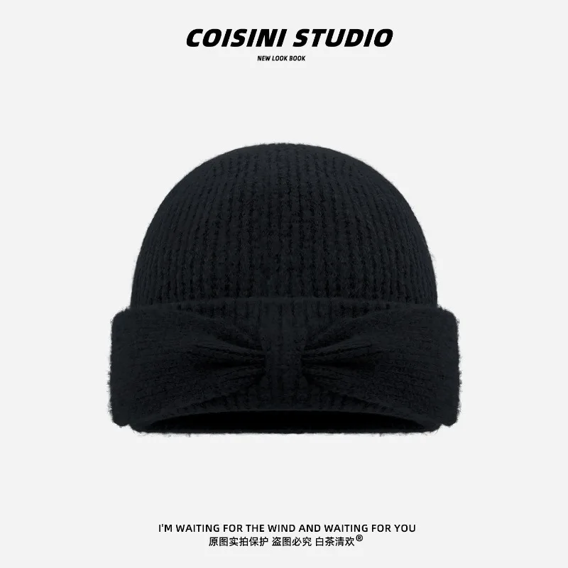 Koreanischer Stil Herbst- und Winter-Strickmütze mit einfacher Schleife für Damen, warme Ohrenschutz-Beanie-Mütze für Herbst und Winter. – Detail 6
