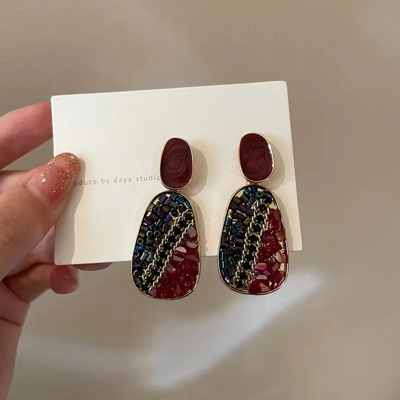 

New S925 silver needle dripping oil crystal colored earrings Korean design simple retro personality trend temperament earrings