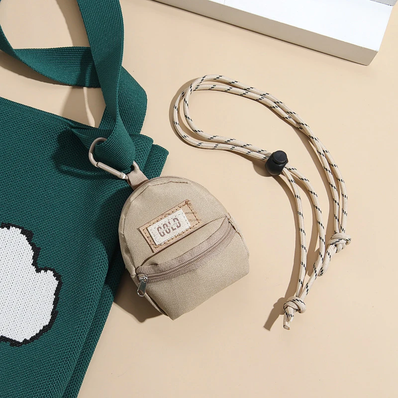 حقيبة عصرية صغيرة لسماعات الرأس حقيبة كروس للنساء محفظة للعملات المعدنية حقيبة معلقة على الرقبة