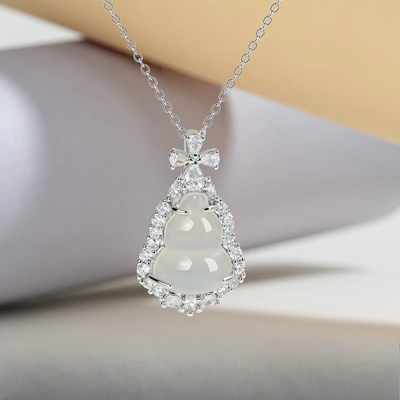 

New Chinese High Ice Transparent Chalcedony Gourd Pendant National Style Temperament Silver Inlaid Agate Fulu