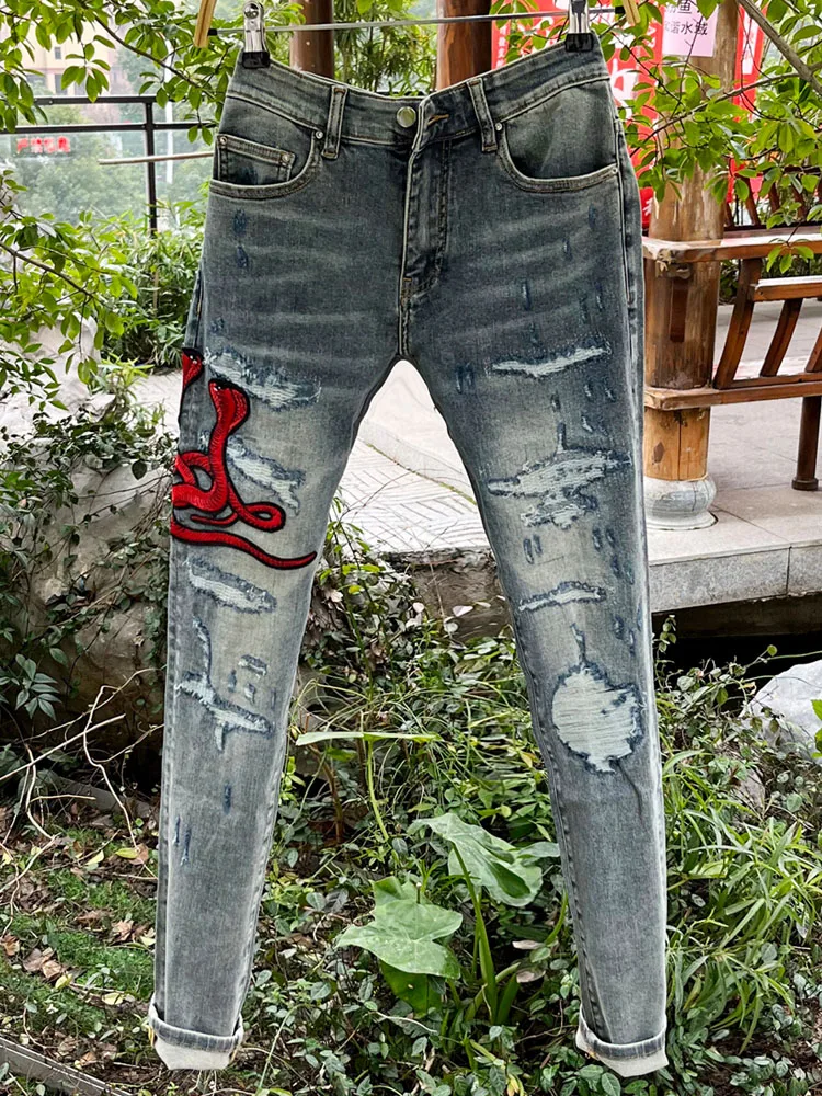 Retro Distred Denim Jeans Men's Slim Fit Elastic Cuffed Pants Four Seasons Embroidered Patch Worked in Water Waed Fabric