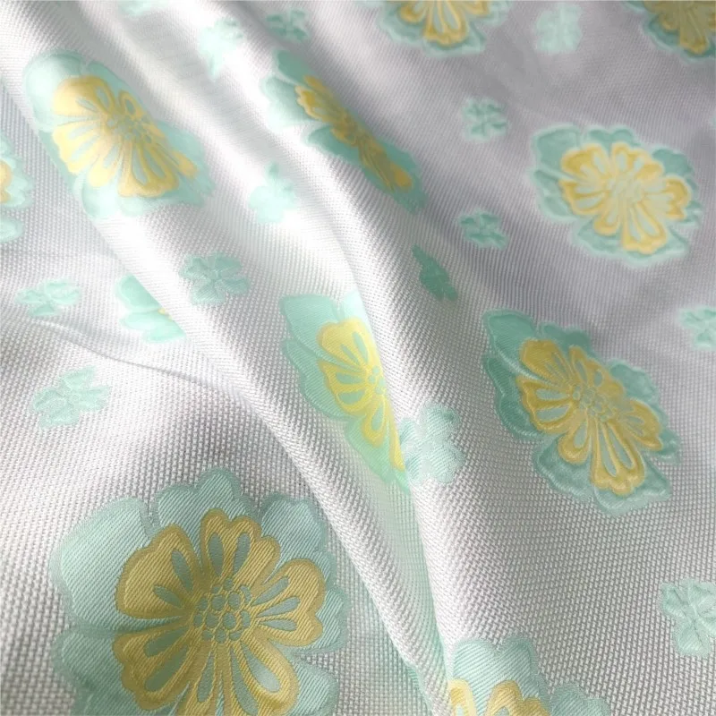 and delicate hollowed-out contrasting color flower jacquard fabric cut dress fashion woven