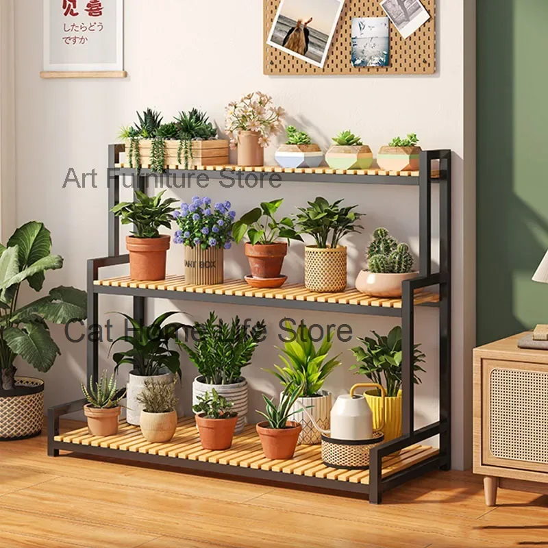 Soporte de flores de Metal de lujo Para interiores, ruedas nórdicas, Estantes de Plantas ajustables, Estantes modernos negros Para Plantas, muebles