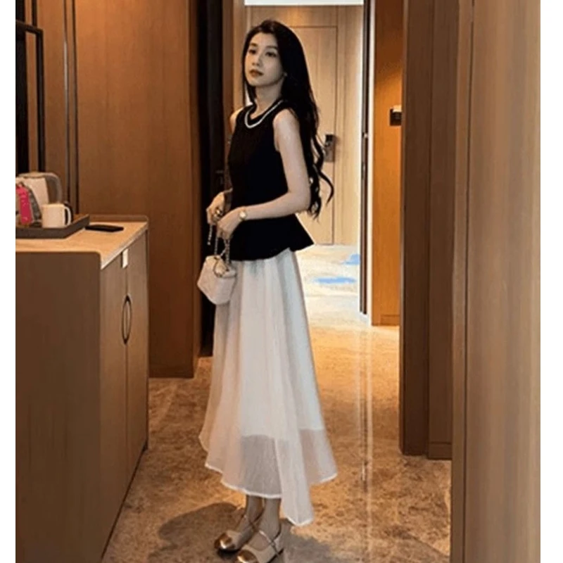 Camisas sin mangas negras elegantes para mujer, faldas de gasa, trajes de dos piezas, camisetas sin mangas negras ajustadas para verano 2025, trajes de faldas