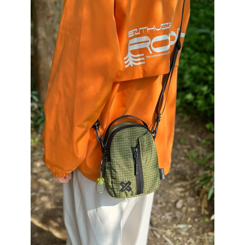 

Autumn and winter outdoor plaid crossbody bag for women2026New Fashionable Casual Multifunctional Mountaineering Phone Bag Trend