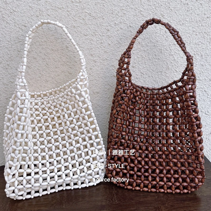 

2026 New Retro Women's Bags Casual Versatile Hollow Design Beach Vacation Handheld Totebag Woven Wood Bead Handmade Bead Bag
