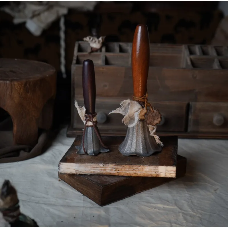 Tulip petal hand rattle witch bell