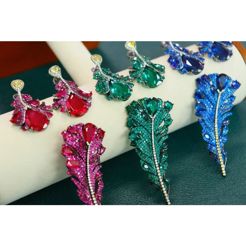 

Ruihe New 925 Silver Feather Red Blue Green 5A Cubic Zircona Gemstones Brooches Earrings Jewelry Set Wedding Gift