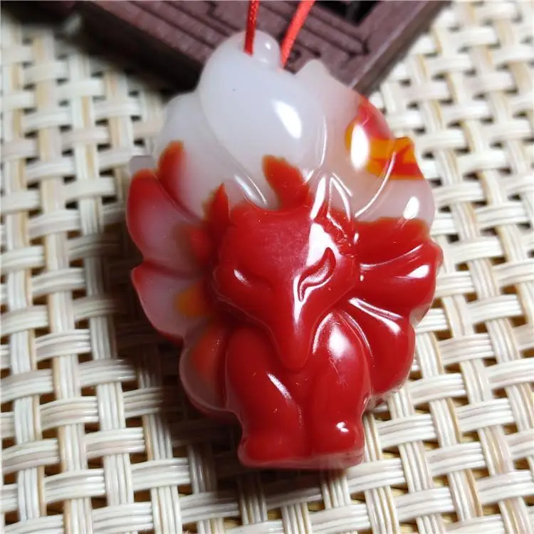 

Chicken Blood Jade Outer Mongolian Material Nine-tailed Fox Pendant Brand