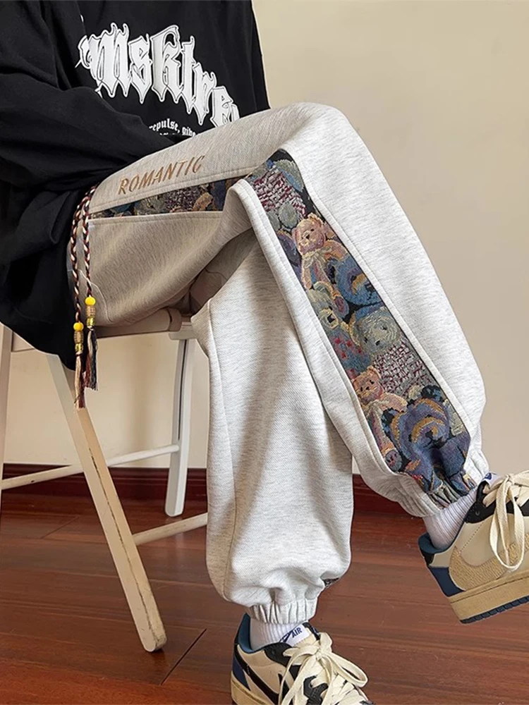 

Мужские повседневные спортивные брюки свободного кроя с вышивкой, модные, в уличном стиле, весна-осень, брендовые, с манжетами, большие размеры для мальчиков