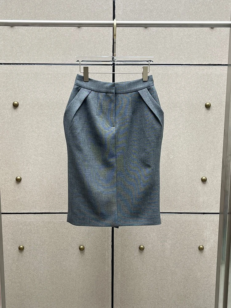 Grey midi skirt with a back slit—a stylish, versatile pleated design for women, new for Autumn 2026.