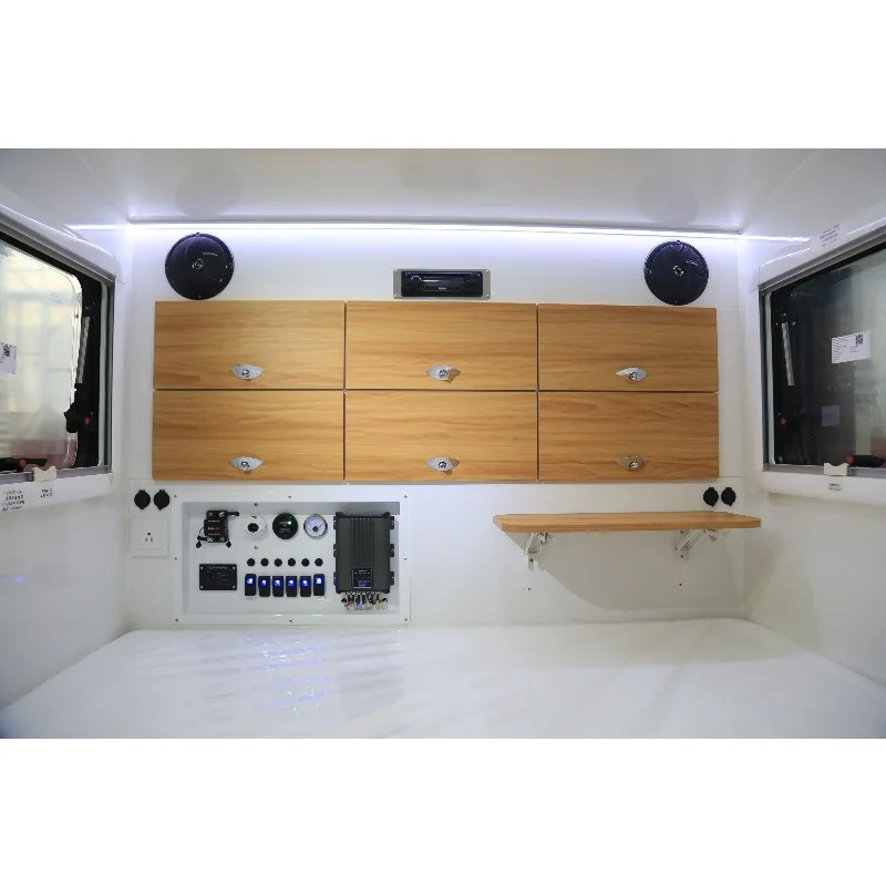 Custom Factory Built Small Teardrop Camper Trailer with Light Emitting Diodes and Movable Features for Off-Road Travel Trailers