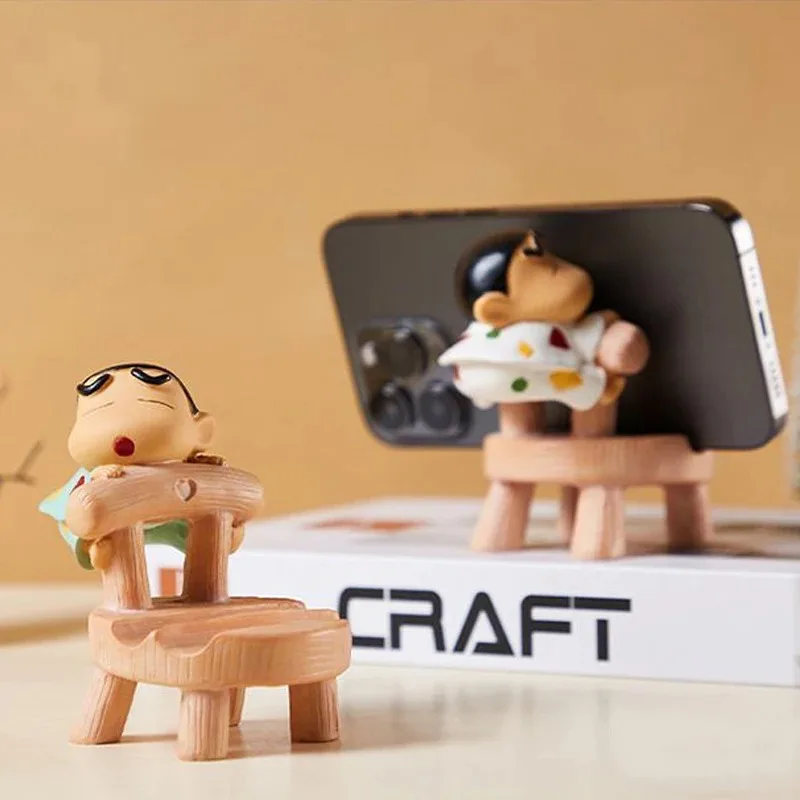 

Anime Crayon Shin chan Mobile Phone Holder Cartoon Crayon Desktop Ornaments Wholesale Cute Kids Toys Kawaii Collect Model Gift
