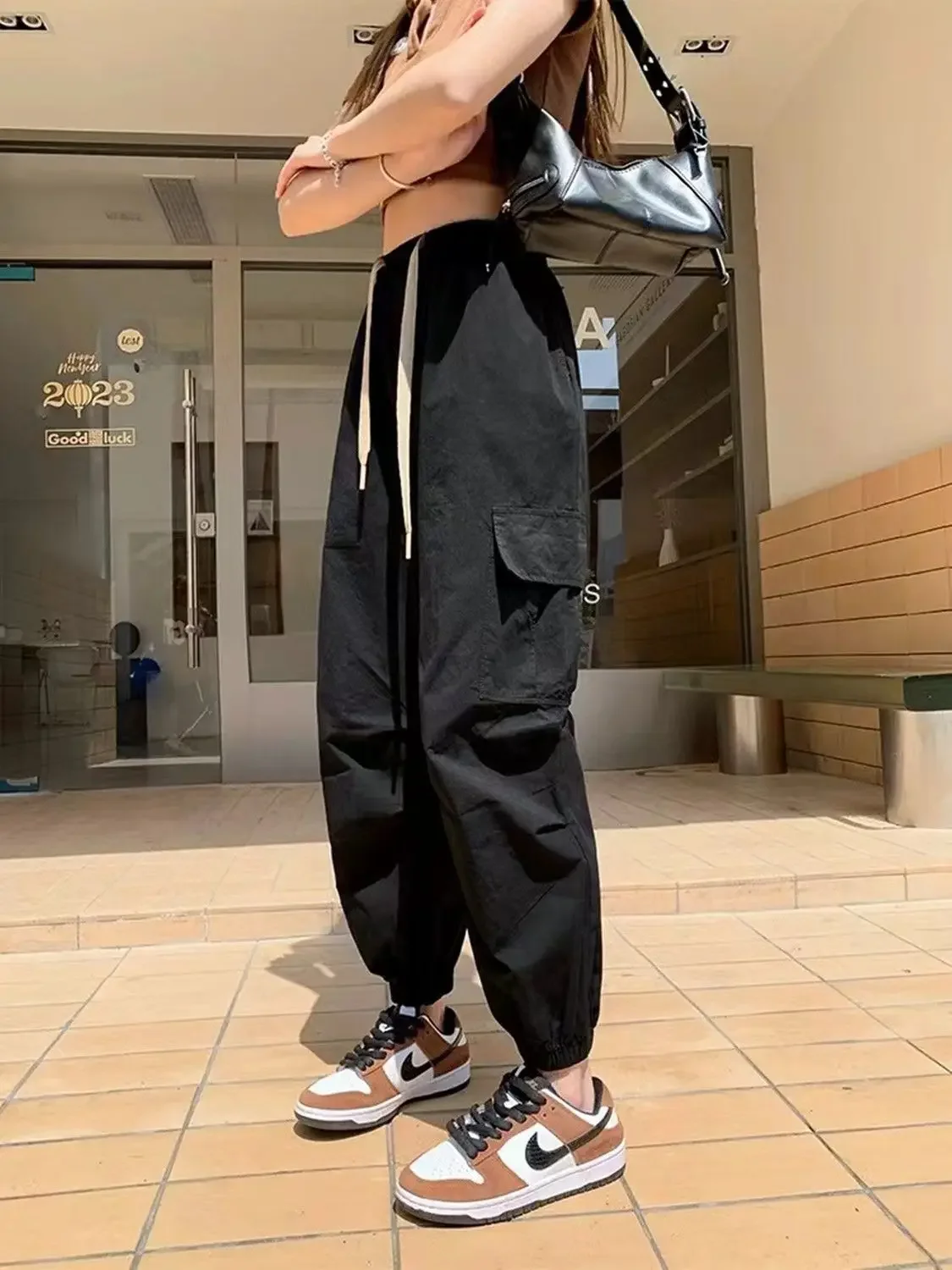 Pantaloni da lavoro per donna in estate Moda sottile Piccole cravatte a nove punte Pantaloni casual larghi Harun dimagranti JJ173