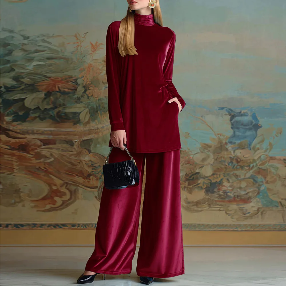 

Модный золотистый бархатный комплект из двух предметов: топ с высоким воротом и разрезом, и брюки с широкими штанинами. Новинка осенне-зимнего сезона. Ретро-стиль, элегантный женский костюм.