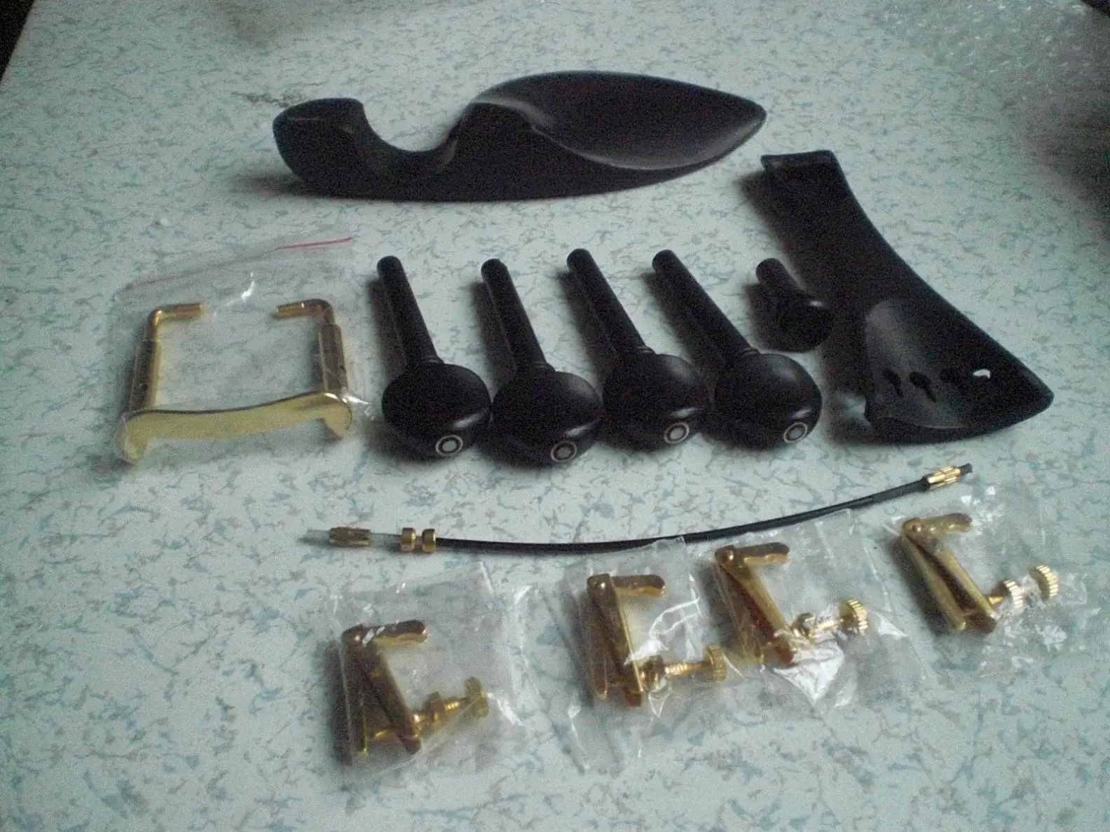 1 Set Ebony Violin Parts 4/4 With Parisian eye and  Gold Color Fine Tuners Chin Rest Clamp Nylon Gut