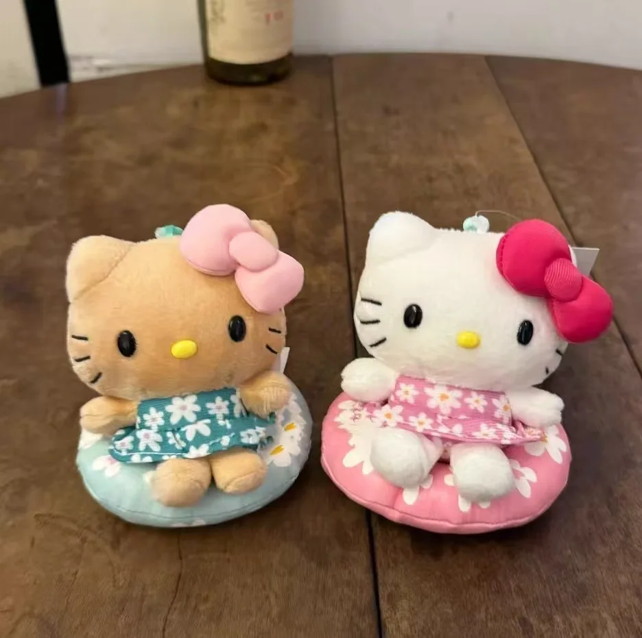 

New Hawaii Black Leather Swimming Circle Hello Kitty Plush Doll Pendant Cartoon KT Cat Doll Bag Hanging Gift