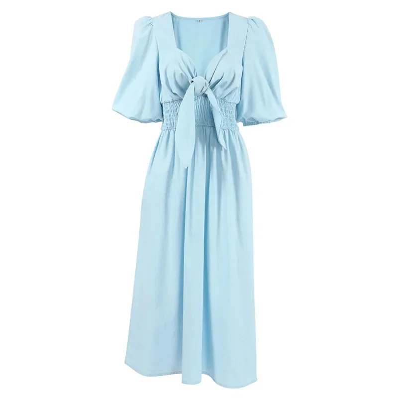Abito longuette chic con maniche a sbuffo per l'estate 2025 con scollo a V e tessuto in cotone e lino con vita smock per un aspetto diurno Breezy