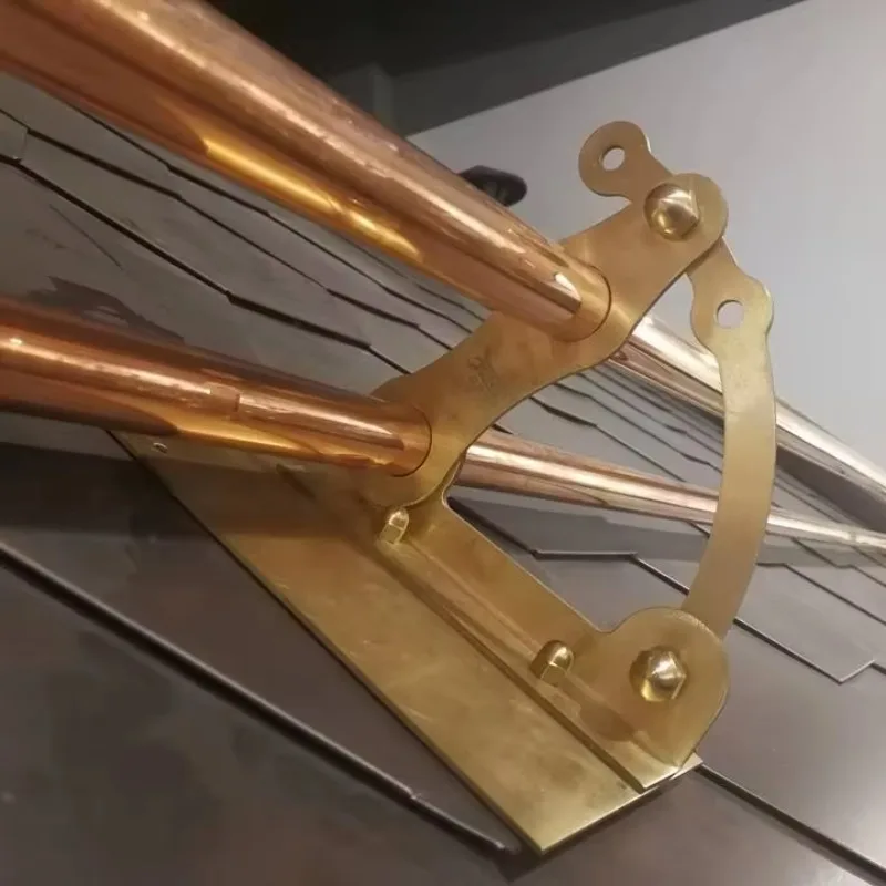 

Copper snow board for slate roof