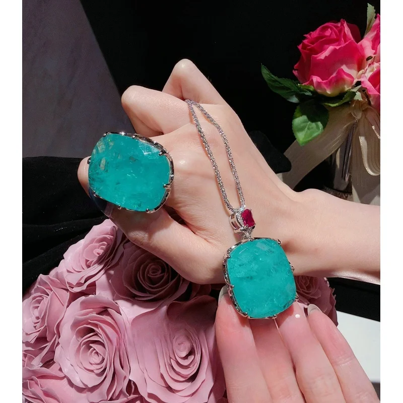Jewelry Neon Light Maldives Blue Luxury10Carat pendant necklace with carved details and diamond-set sugar cube ring