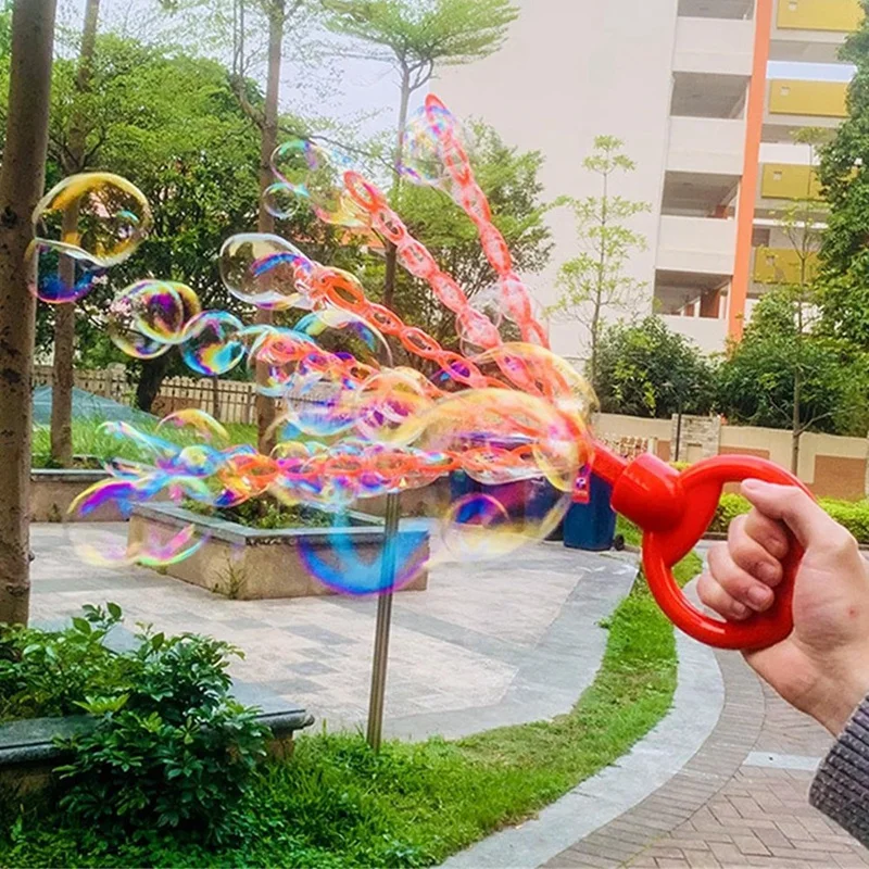 Baguette à bulles portative à cinq griffes avec visage souriant, 32 trous, peut faire naître un grand nombre de bulles et souffler des bulles