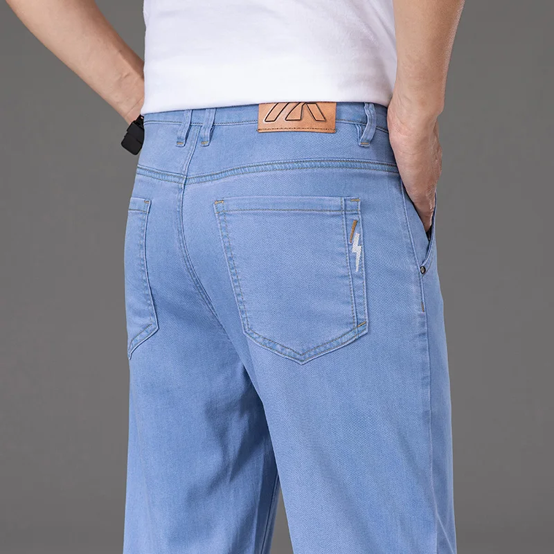 

2025 Summer New Men's Thin Light Blue Loose Jeans Lyocell Fabric Business Fashion Elasticity Denim Trousers Male Brand Pants