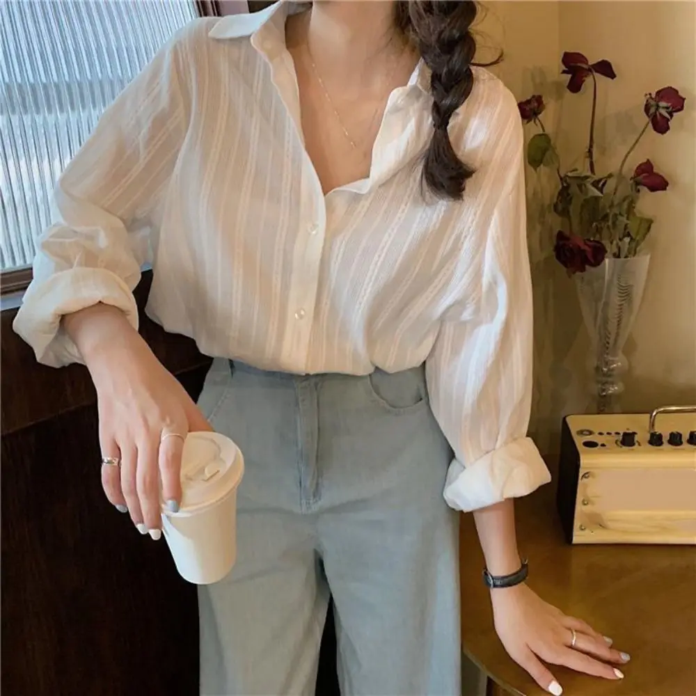 เสื้อเชิ้ตลายทางสไตล์เรโทร แขนยาว ทรงหลวม บางเบา ใส่สบาย เหมาะสำหรับฤดูใบไม้ผลิ ฤดูร้อน ฤดูใบไม้ร่วง สำหรับผู้หญิง