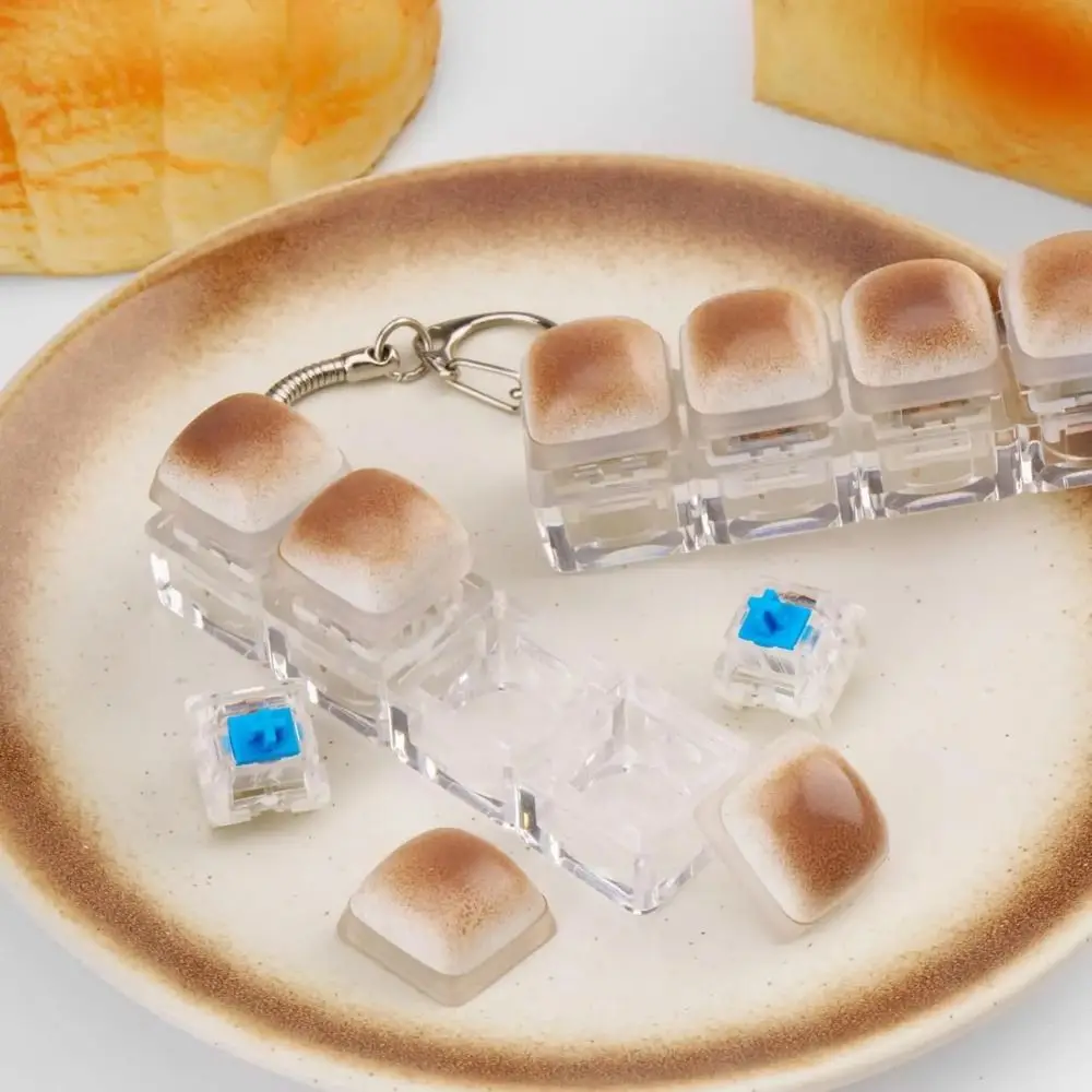 

Creative Keyboard Keychain Toy Cute Portable Keyboard Button Keyring Bread Keycap Caramel Bread Design Fidget Keycap Keychain