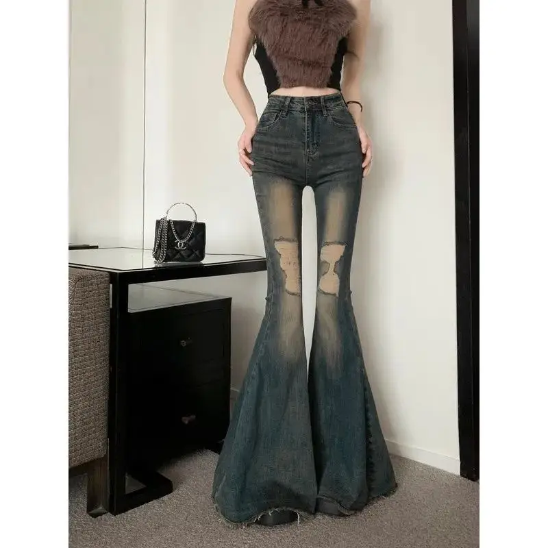 Retro Hong Kong style fishtail flared jeans, women's high-waisted slim niche design sense ripped mop wide-leg trousers