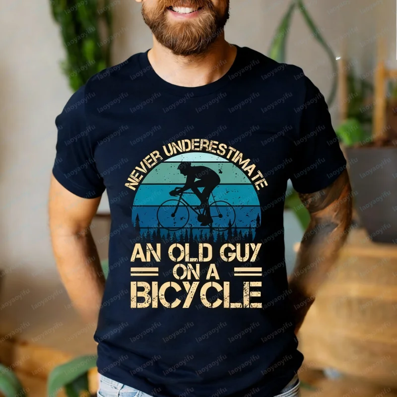 Funny Cyclist Cotton T-Shirt: Never Underestimate An Old Guy on A Bicycle Graphic T Shirts Harajuku Mens T Shirts Streetwear Top