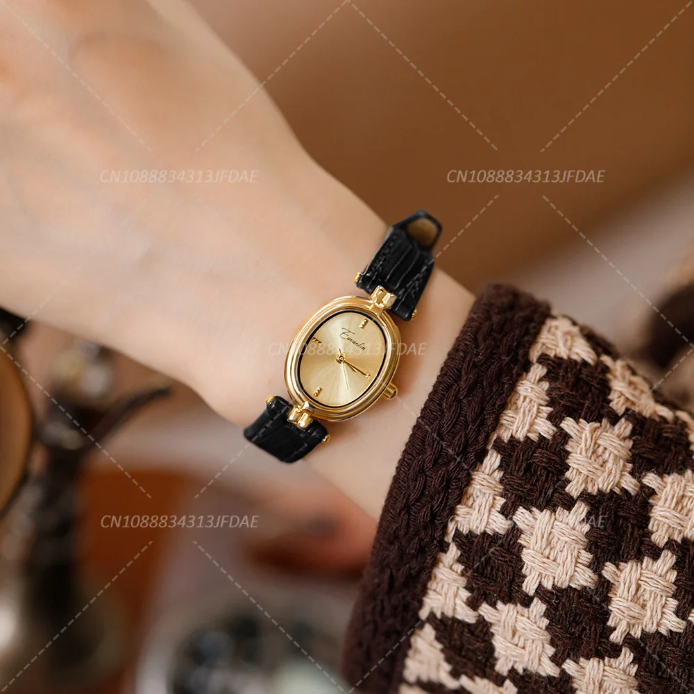 

Кварцевые наручные часы в стиле ретро с нишевым дизайном, овальный золотой циферблат, кварцевые женские часы, повседневные коричневые кожаные модные часы