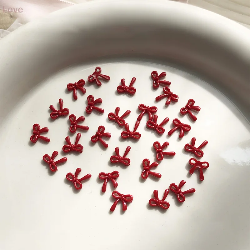 100 個 3D ネイルアート赤い弓チャーム用品かわいいアクセサリー樹脂爪の装飾製品マニキュア装飾材料ツール